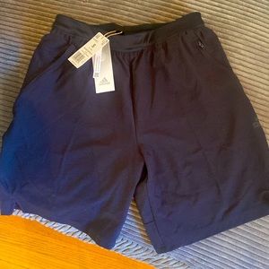 Mens Black Addidas shorts size small NWT.